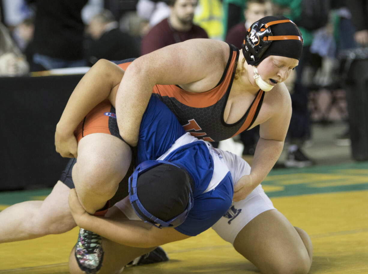 Washougal's Abby Lees works to turn over Federal Way's Mariah Stewart during their Girls 235-pound State Wrestling championship match Saturday, Feb. 18, 2017, in Tacoma, Wash. Lee won the match by pin.