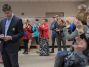 Bond supporters applaud as Vancouver Public Schools Superintendent Steve Webb thanks them for their work Tuesday evening. Vancouver&#039;s bond measure was short of validation, but more votes will be counted today.