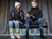 Battle Ground High School students Katie Beard, left, and Arty Ricardo rehearse a scene from the play &quot;Almost, Maine&quot; at Battle Ground High School on Monday.