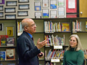 Fircrest Neighborhood Association Co-Chair Margaret Milem, right, listens as Khalid Khan of the Islamic Society of Southwest Washington gives a &quot;What is Islam?&quot; presentation to neighborhood association members at their Feb. 7 meeting. Some residents in the neighborhood were upset association leaders opted to go through with a meeting topic focusing on religion.