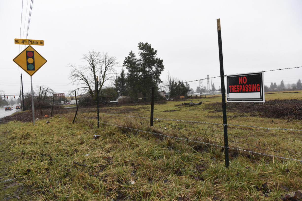 The owner of a lot off Northeast Fourth Plain Boulevard wants use it for a new development. But doing so could conflict with plans to build a new road meant to alleviate traffic problems.