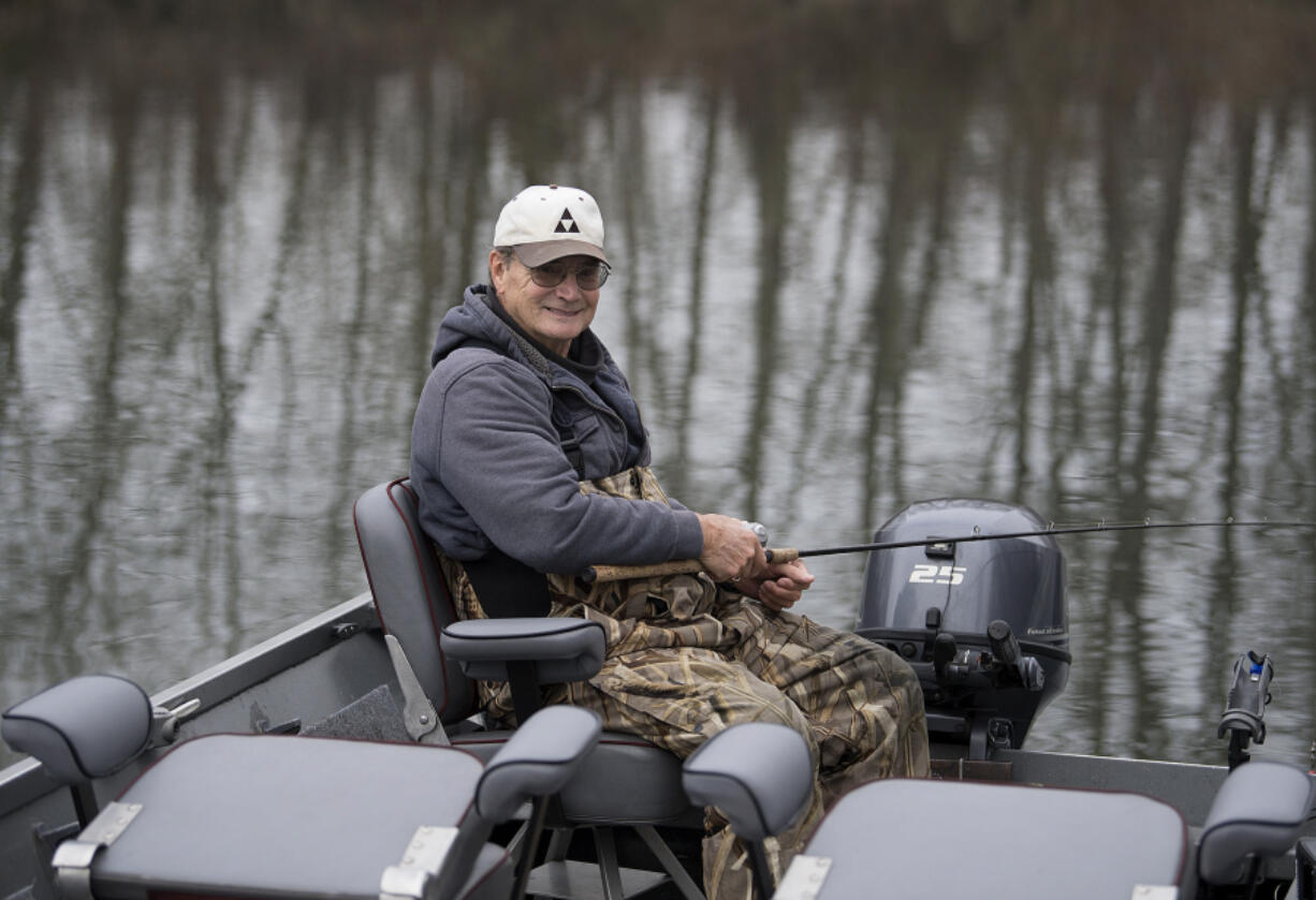 Veteran salmon angler Winston Falls of Vancouver pauses at the Langsdorf Landing boat ramp on the Columbia River downstream of Vancouver. He starts salmon fishing in late February and fishes a couple of days a week -- or more -- until late October.