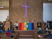 Mayor Tim Leavitt, left, joins local religious leaders during an interfaith gathering at Vancouver Heights United Methodist Church on Wednesday afternoon.