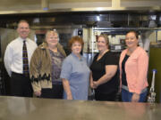 Washougal: Sodexo Nutrition Services Director Mark Jasper, from left, with Washougal School District kitchen staffers Laura Spangenberg, Sharon House, Nancy Sonneson and Megan Bettis, who received all clean reports during recent inspections.