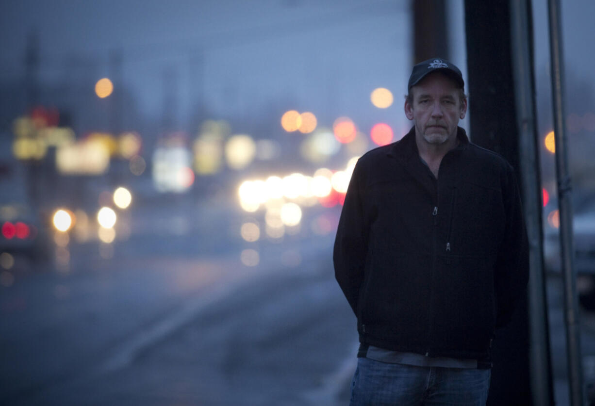 Marion Thomas, 50, was behind the wheel in two vehicle crashes that each killed a person in the roadway. Investigators in both crashes said he was not at fault. Thomas is seen at the site of the first crash on Highway 99 near 78th Street in Hazel Dell.