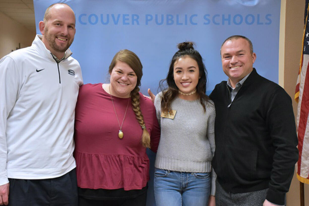 Felida: Skyview High School boys&#039; basketball coach Matt Gruhler, from left; Elyse Azorr, Key Club adviser; Kelly Ann Tran, Key Club president; and Jim Gray, Skyview principal, teamed to raise more than $12,000 for the Salvation Army.