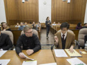 Defense attorney Nathanael Vansoest, left, a student at Cascadia Technical Academy, gears up for the mock trial with plaintiff attorney Keegan Dittmer of Columbia River High School on Thursday at the Clark County Courthouse.