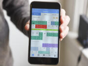 Vancouver native Zach Smith showcases NurseGrid, the app from a Portland-based startup with the same name. Smith, a nurse for seven years, said the app helps manage nurses&#039; hectic schedules.