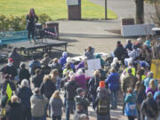 Audrey Miller of Planned Parenthood talks to people gathered for a Saturday rally to save the Affordable Care Act from repeal at Clark College in Vancouver.