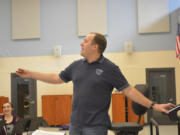 Hockinson High School Band Director Corey McEnry leads rehearsal in the new high-tech band room, which features soundproof practice rooms, a new sound system and enough lockers for all musicians to lock up their instruments. In the past, the band practiced in a classroom or the auditorium.