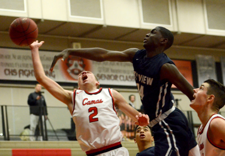 Skyview junior Samaad Hector denies Camas senior Logan Miller at Camas High School on Wednesday, February 1, 2017.