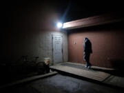 Ralph Austin, 56, walks into the Vancouver Friends of the Carpenter day center on Jan. 27. Austin lives at Share House, but regularly visits the center to talk with staff assistant Otha Commons.