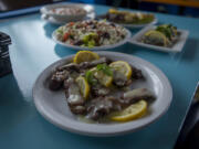 Steak strips are served with a variety of other dishes at George&#039;s Molon Lave in Battle Ground on Tuesday morning, Feb. 7, 2017.