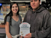 Orchards: Heritage High School students Amy Rodriquez and Luis Reyes worked on getting Heritage&#039;s school-based enterprise certified and will be recognized at the DECA International Career Development Conference in Anaheim, Calif.