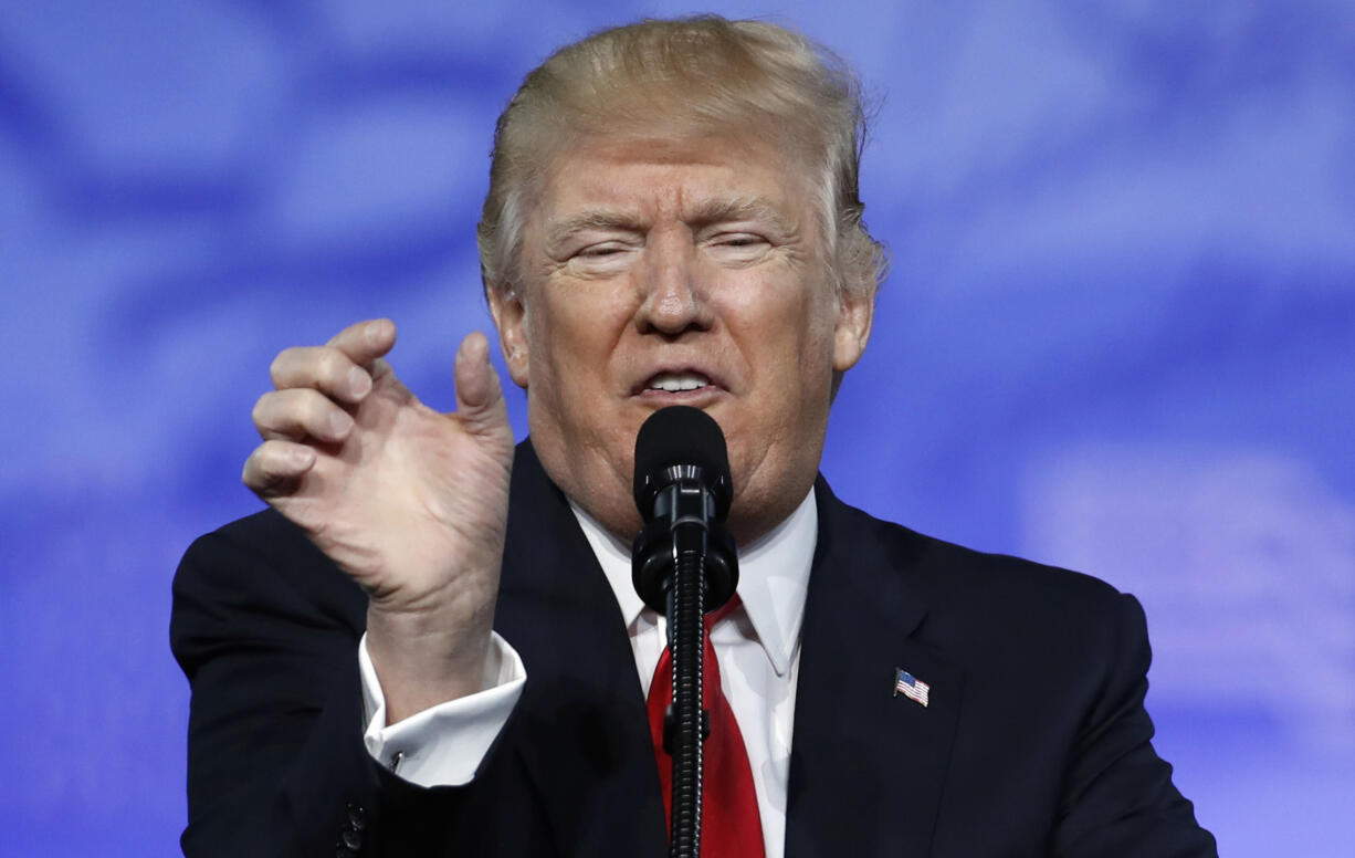 President Donald Trump gestures as he speaks at the Conservative Political Action Conference (CPAC), Friday, Feb. 24, 2017, in Oxon Hill, Md.