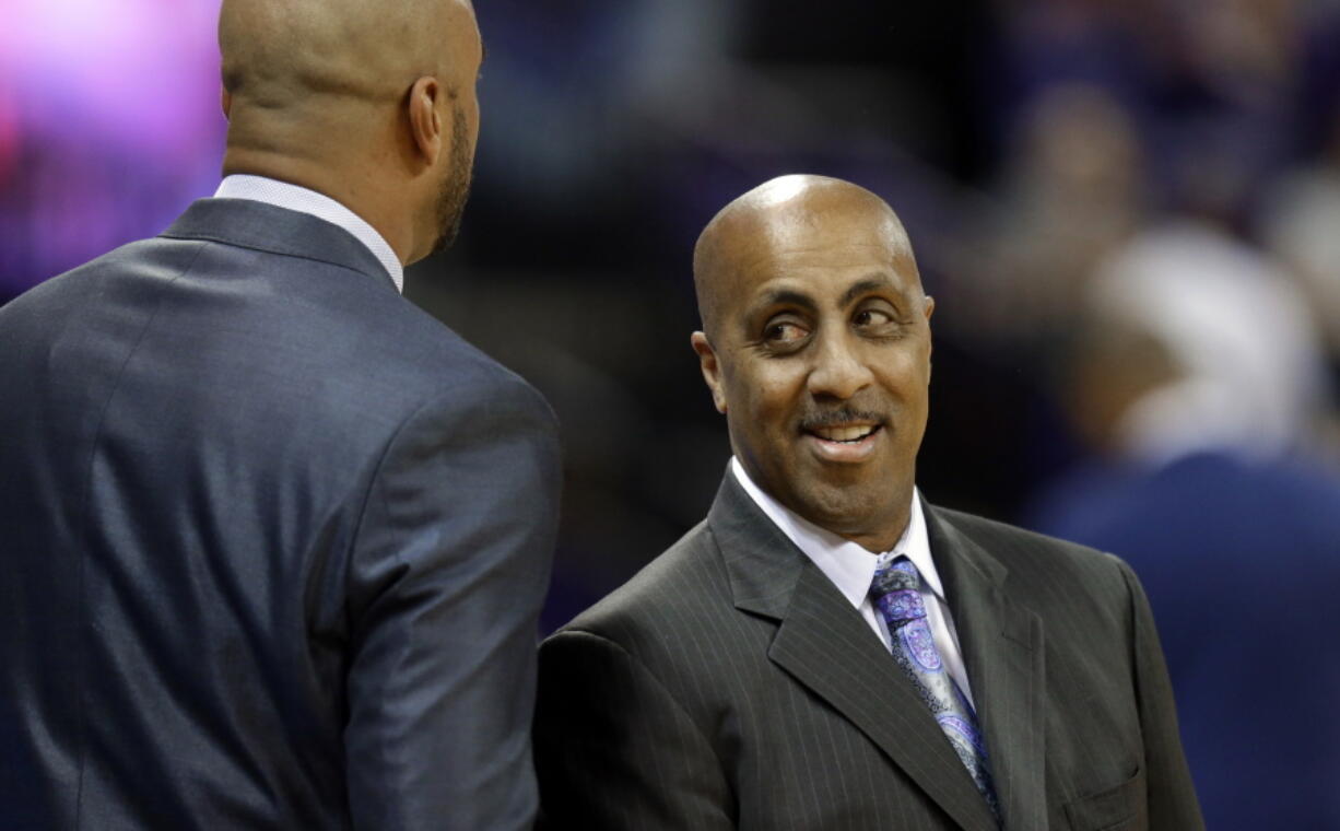 Washington coach Lorenzo Romar, right, greets a member of the Arizona State coaching staff before an NCAA college basketball game, Thursday, Feb. 16, 2017, in Seattle. (AP Photo/Ted S. Warren) (Ted S.