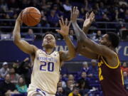 Washington guard Markelle Fultz (20) shoots against Arizona State forward Andre Adams during the first half of an NCAA college basketball game, Thursday, Feb. 16, 2017, in Seattle. (AP Photo/Ted S.