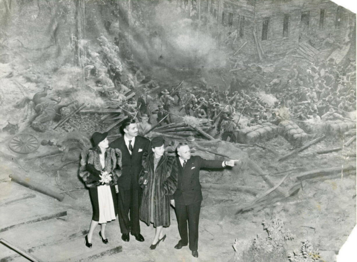 Vivien Leigh, Clark Gable, Olivia DeHaviland and George Simons visit Cyclorama, a colossal panoramic painting depicting the Battle of Atlanta from the American Civil War, during the Gone with the Wind premiere, in Atlanta on Dec 16, 1939. The painting will soon be moved from the building where it has been displayed for nearly a century. Historians said moving the 6-ton Cyclorama from Grant Park to the Atlanta History Center across town marks a major milestone in its restoration. The move is to begin Thursday, Feb. 9, 2017.