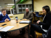 Elise Menashe, executive director of the Boys &amp; Girls Clubs of Southwest Washington, speaks with Matthew Butte, development director at the Children&#039;s Center, left, and Brian Willoughby, director of community benefit with Legacy Health, about the recent collaboration among the three organizations.