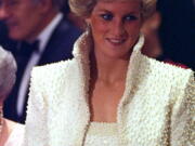 The Princess of Wales, spangled with pearls, visits Hong Kong in 1989.