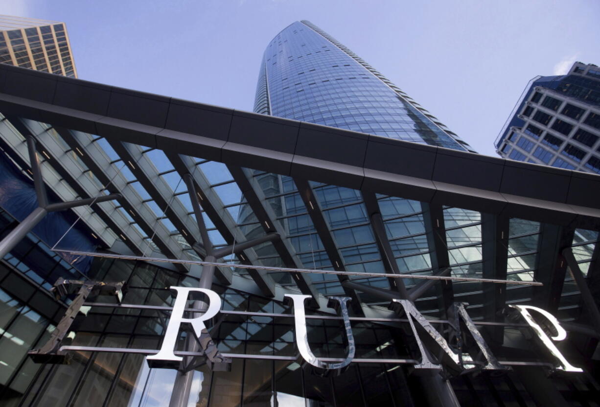 The still-under-construction Trump International Hotel and Tower in Vancouver, B.C., is seen Jan. 20, 2017. The 69-story tower has drawn praise for its sleek, twisting design. Prices for the condominiums have set records. But the politics of President Donald Trump have caused such outrage that the mayor won&#039;t attend the Feb. 28 grand opening and has lobbied for a name change.