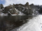 The Poudre River winds through a scenic canyon outside Fort Collins, Colo. Global warming could melt mountain snows more slowly, researchers said Feb. 27, a peculiar finding that might be bad news for the American West and other regions that depend on snow for water.