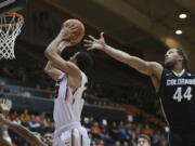 Oregon State&#039;s Kendal Manuel, left, goes to the basket past Colorado&#039;s Josh Fortune (44) during the first half of an NCAA college basketball game in Corvallis, Ore., Thursday, Feb. 16, 2017. (AP Photo/Timothy J.