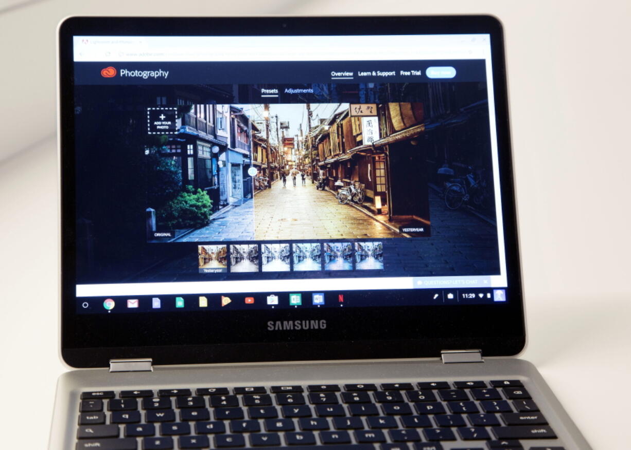 A Google Chromebook displays Adobe Lightroom in New York.