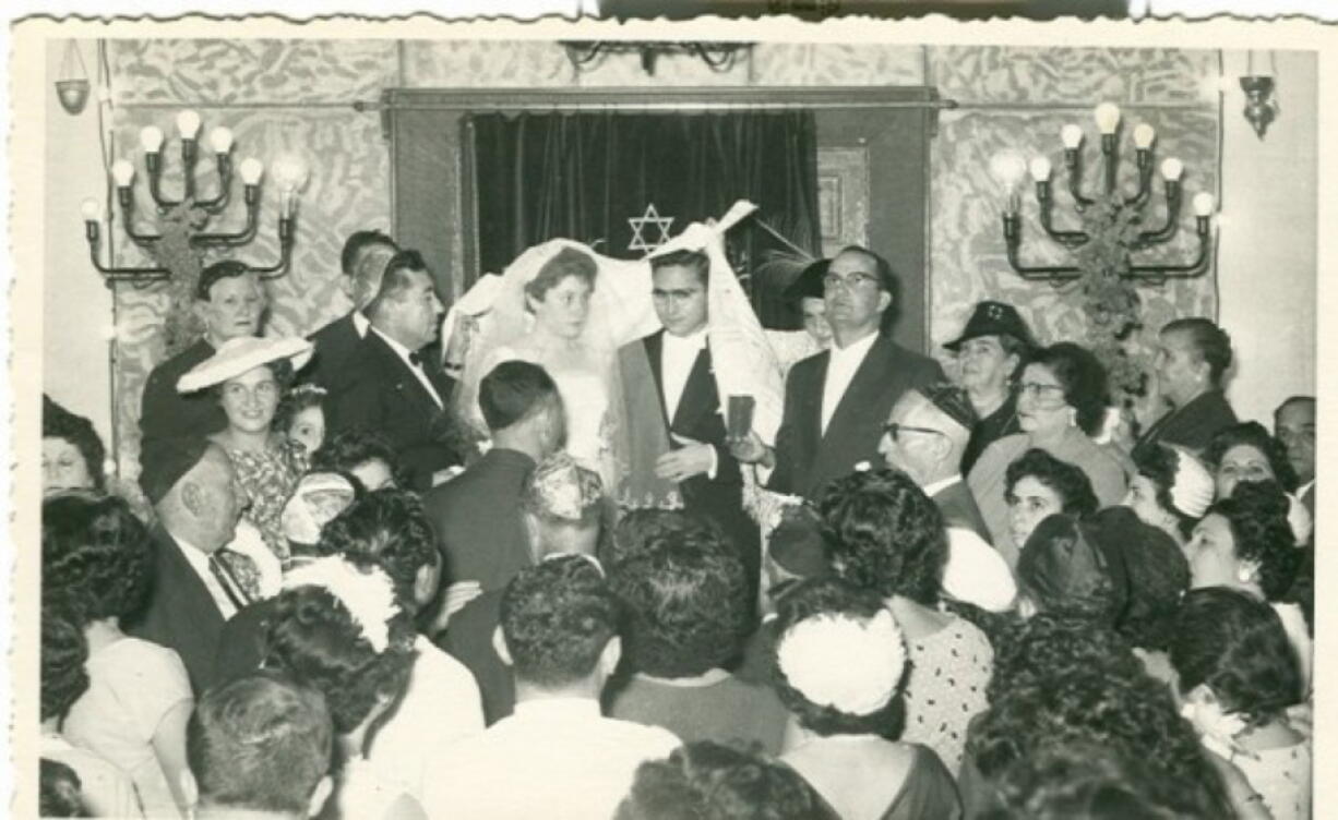 In this 1950 handout photo, provided by Tales of Jewish Sudan, a Jewish wedding is held in Khartoum synagogue, Sudan. The center of Jewish religious life, the synagogue was established in 1926 in downtown Khartoum, replacing an older small one. The synagogue was sold in 1987 after most Sudanese Jews left the country and currently is a bank.