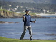 Jordan Spieth reacts on the 18th green of the Pebble Beach Golf Links after winning the AT&amp;T Pebble Beach National Pro-Am golf tournament Sunday, Feb. 12, 2017, in Pebble Beach, Calif.