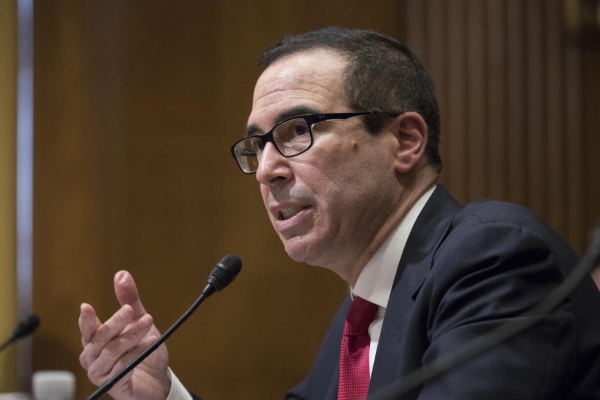 Treasury Secretary-designate Steven Mnuchin testifies on Capitol Hill in Washington at his confirmation hearing before the Senate Finance Committee. (AP Photo/J.