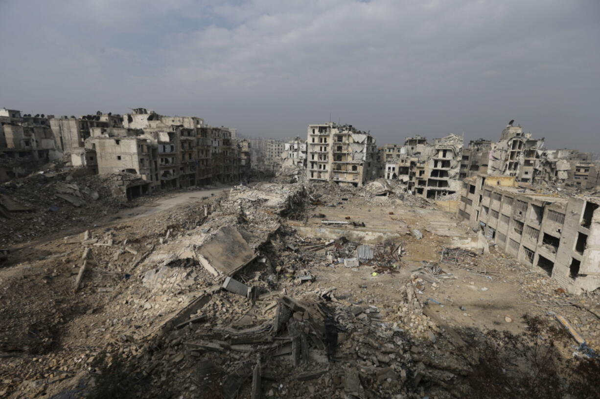 Mounds of rubble remain from what used to be high rise apartment buildings in the once rebel-held Ansari neighborhood of eastern Aleppo, Syria. Aleppo, Syria&#039;s largest city, was widely brought to ruin by years of war, and now with Russia and Turkey leading peace efforts, international officials say it is time to start talking about rebuilding Aleppo and other cities. But there are few answers on how to do it, with the world reluctant to donate the billions needed and a political settlement in the war still uncertain and far off.