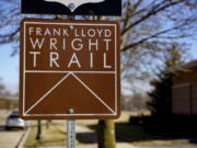 This Feb. 21, 2017 photo shows a sign in Madison, Wis., pointing the way to Monona Terrace, a site on Wisconsin&#039;s new Frank Lloyd Wright Trail. The 200-mile route highlights places around the state designed by the famous architect, who was born in Wisconsin 150 years ago on June 8, 1867.