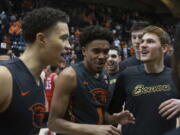 Oregon State&#039;s Stephen Thompson Jr., center, celebrates with his teammates after the Beavers defeated Utah 68-67 in an NCAA college basketball game in Corvallis, Ore., Sunday, Feb. 19, 2017. Thompson Jr. scored 31 points in leading the Beavers to their first win in a Pac-12 Conference game this year. (AP Photo/Timothy J.