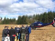 Emergency responders load a burned boy into a LifeFlight helicopter Saturday afternoon.