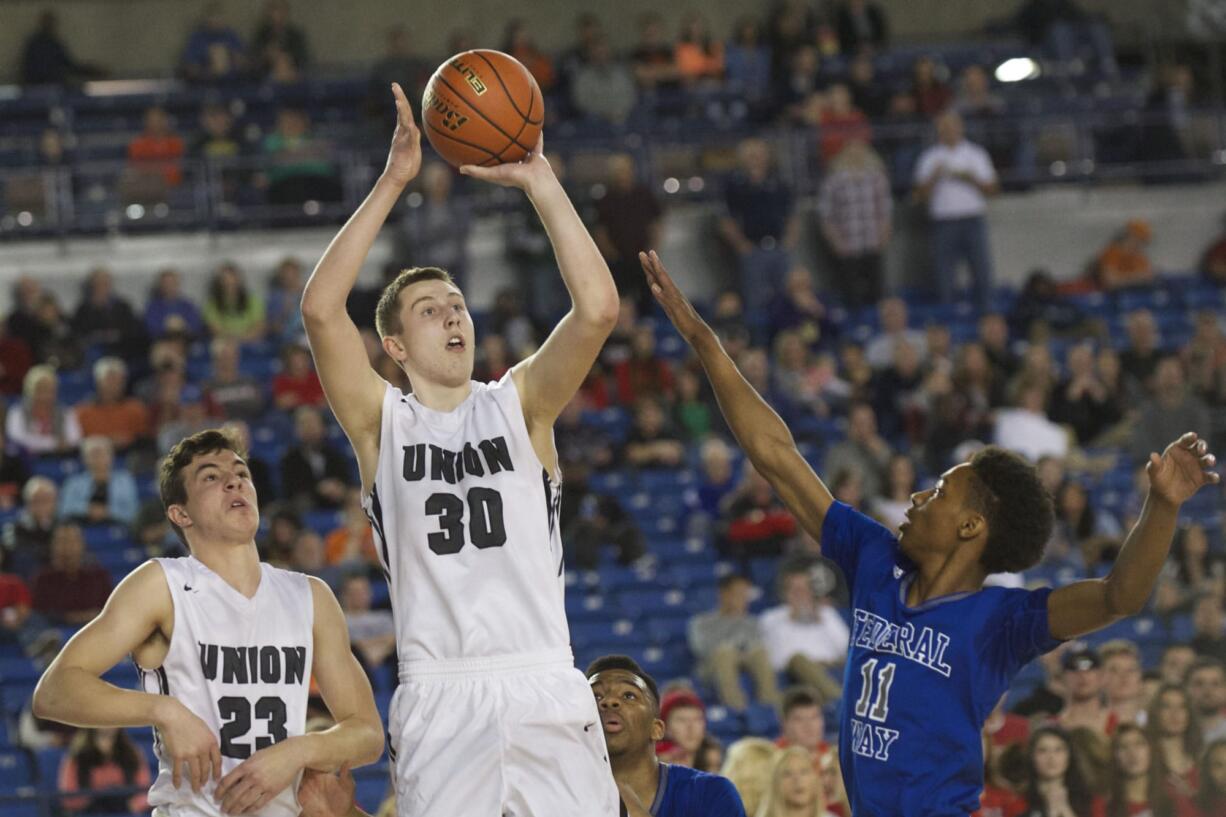 Cameron Cranston shoots a three as Union loses to Federal Way 61-58 at the 2015 WIAA Hardwood Classic 4A Boys tournament at the Tacoma Dome, Friday, March 6, 2015.