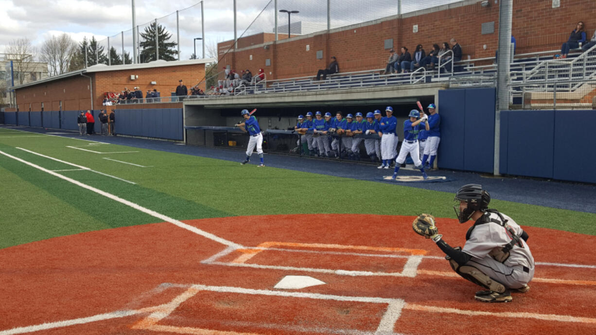 Jeff Reeburgh catches for Union High School during a high school baseball