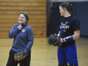 La Center pitcher Abby England, left, and catcher Megan Muffett attribute their success on the softball field to their long friendship and experience as teammates.