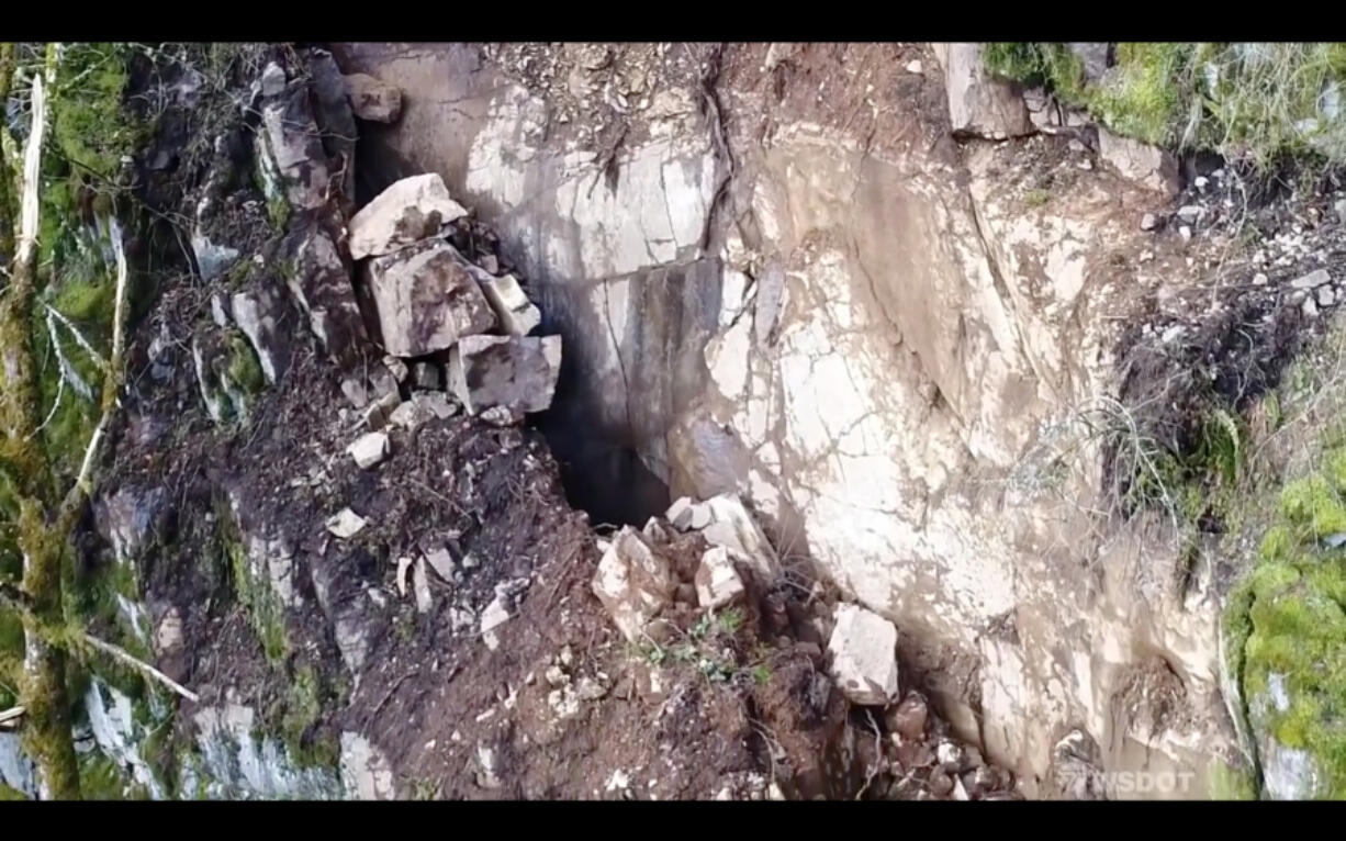 The hillside above state Highway 503 is still too unstable for crews to inspect. WSDOT officials say some of the rock slabs are extremely large, with at least one of them being about the size of a car, based on aerial footage.