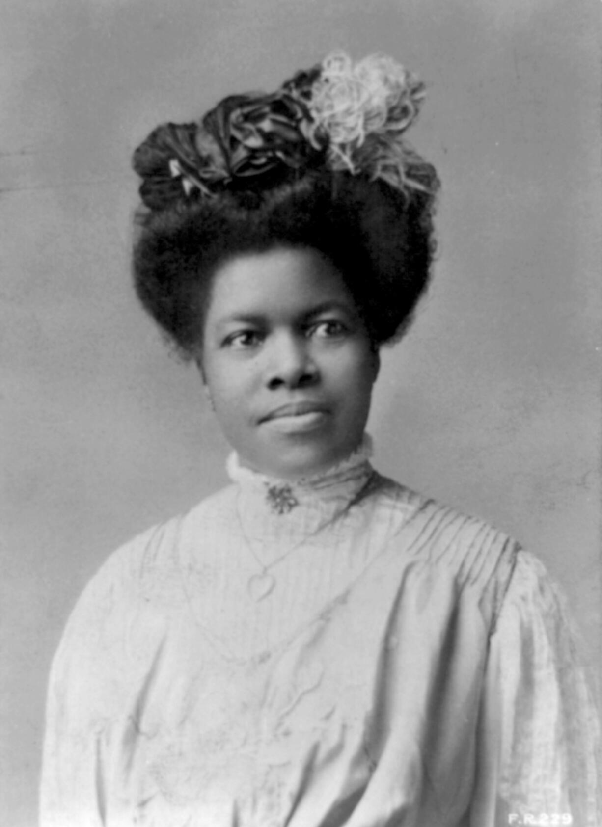 A portrait of Nannie Helen Burroughs.