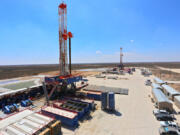 A Patterson-UTI drilling rigs that uses hydraulic feet to &quot;walk&quot; from one drill site to another. This one operates in West Texas.