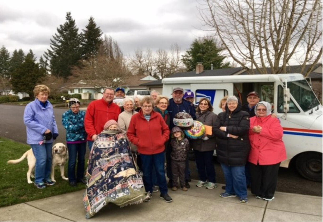 Northwest: Members of the Northwest Neighborhood Association with Scott McHale, the neighborhood&#039;s mail carrier for the last 17 years who is retiring, on his last day of work.