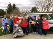 Northwest: Members of the Northwest Neighborhood Association with Scott McHale, the neighborhood&#039;s mail carrier for the last 17 years who is retiring, on his last day of work.