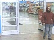 Battle Ground police are looking for this man, shown here in surveillance video taken from the Wal-Mart, in connection with a March 15 report of two females being touched inappropriately.