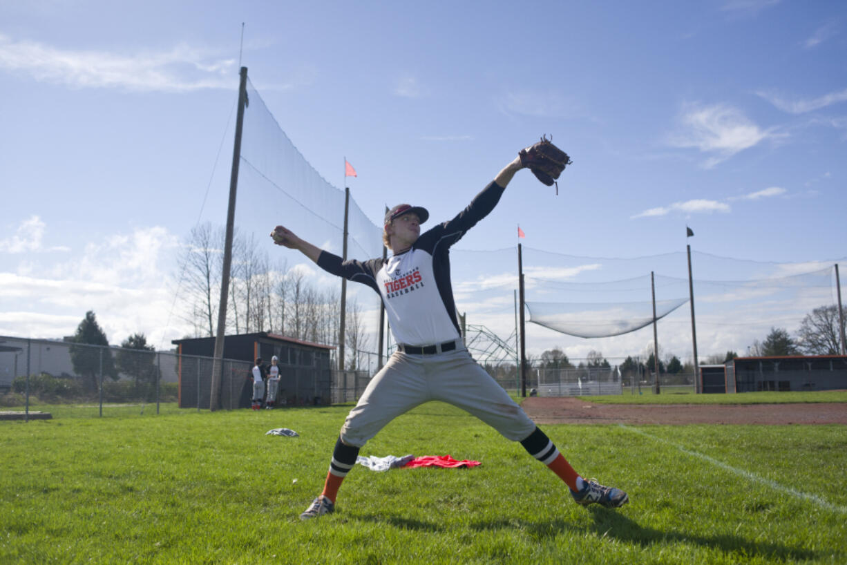 Battle Ground senior Isaiah Smith warms up before a practice on Tuesday. The outfielder is one of the West&#039;s top prep prospects for the 2017 Major League Baseball draft.