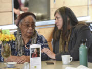 Becky Archibald, right, supports Lydia Newcomb on Monday during a meeting at the Firstenburg Community Center discussing a recent decision by Meals on Wheels People to close the center&#039;s dining room, which now serves about 14 seniors a day and delivers about 140 meals a day to housebound seniors.