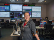 Jenne Driggers, former Evergreen High student, in the control room of the Hanford LIGO lab near the Tri-Cities.