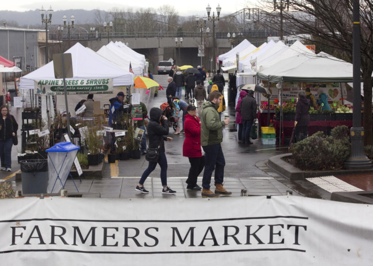 Customers shopped during the first day of Vancouver Farmers Market in downtown Vancouver. Saturday marked the start of the market&#039;s 28th season.