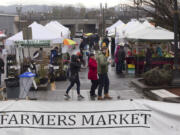 Customers shopped during the first day of Vancouver Farmers Market in downtown Vancouver. Saturday marked the start of the market&#039;s 28th season.