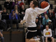 Alex Glikbarg of Camas competes in the dunk contest during at the Les Schwab Roundball Shootout.